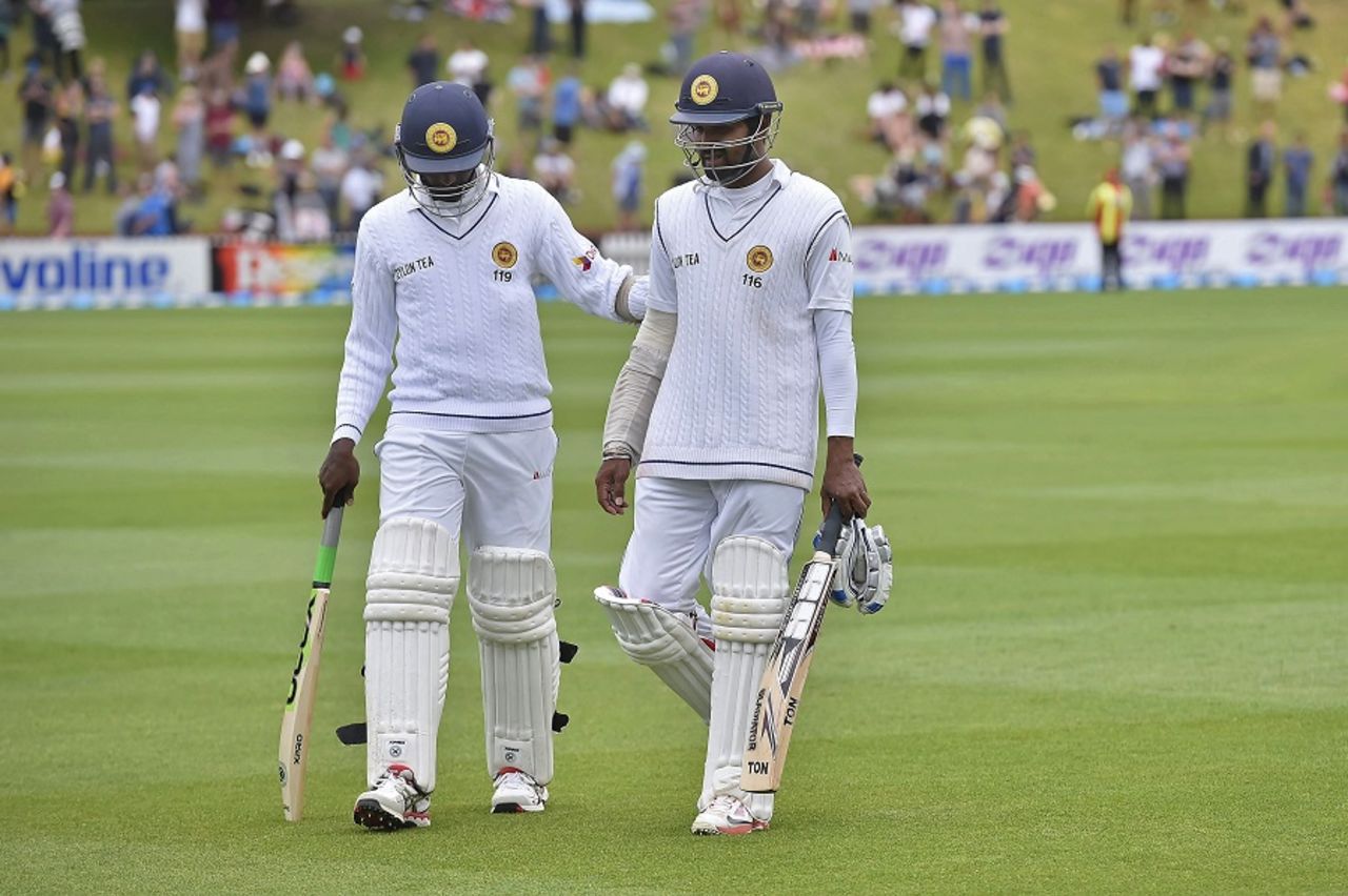 Nuwan Pradeep pats half-centurion Lahiru Thirimanne's back, New Zealand v Sri Lanka, 2nd Test, Wellington, 5th day, January 7, 2015
