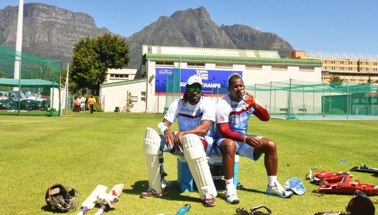 Chris Gayle and Dwayne Smith chill out during training, Cape Town, January 6, 2014