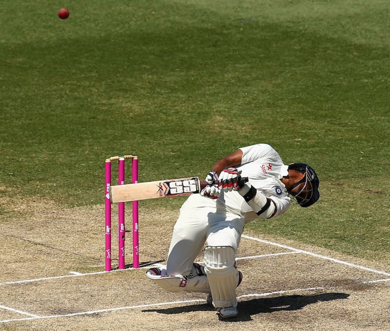 Wriddhiman Saha avoids a bouncer, Australia v India, 4th Test, Sydney, 4th day, January 9, 2015