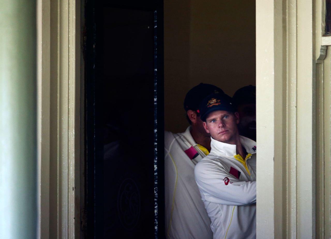 Steven Smith peeks out of the Australian dressing room, Australia v India, 4th Test, Sydney, 4th day, January 9, 2015