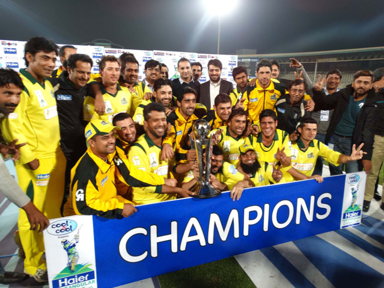 The Khyber-Pakhtunkhwa Fighters players celebrate with the series trophy, Baluchistan Warriors v Khyber-Pakhtunkhwa Fighters, Pentangular One Day Cup, Karachi, January 11, 2015