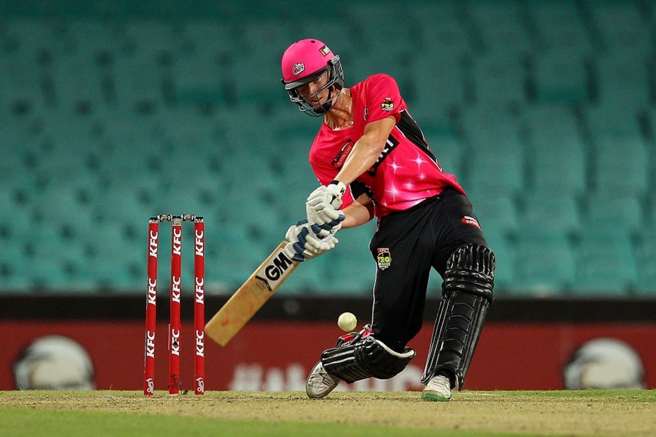 Jordan Silk prepares for a mow during his 34-ball 67, Sydney Sixers v Adelaide Strikers, Big Bash League 2014-15, Sydney, January 14, 2015