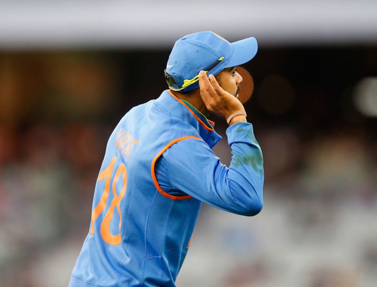 "I can't hear you"... Virat Kohli gestures to the crowd, Australia v India, Carlton Mid Tri-series, Melbourne, January 18, 2015