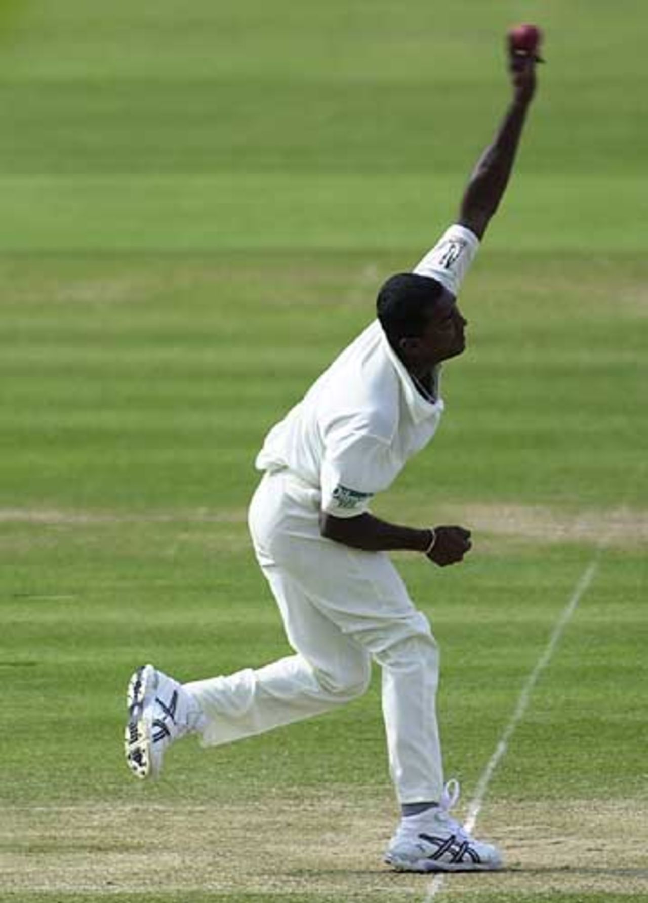 Ruchira Perera bowling from the Pavilion End, England v Sri Lanka, First Test, Lord's 2002