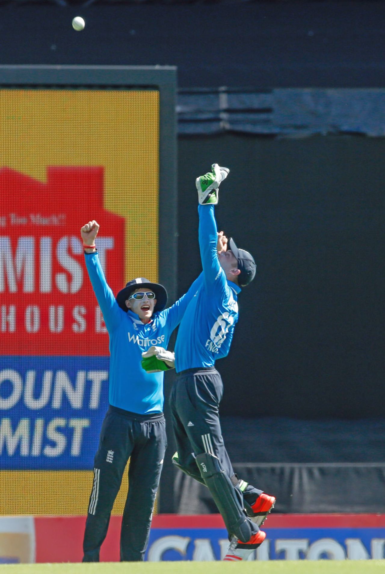 Jos Buttler celebrates after taking a catch to dismiss Virat Kohli, England v India, Carlton Mid Tri-series, Brisbane, January 20, 2015