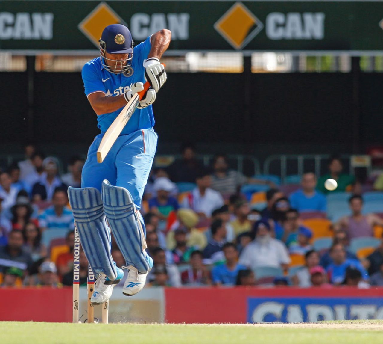 MS Dhoni gets off the ground to fend a delivery, England v India, Carlton Mid Tri-series, Brisbane, January 20, 2015