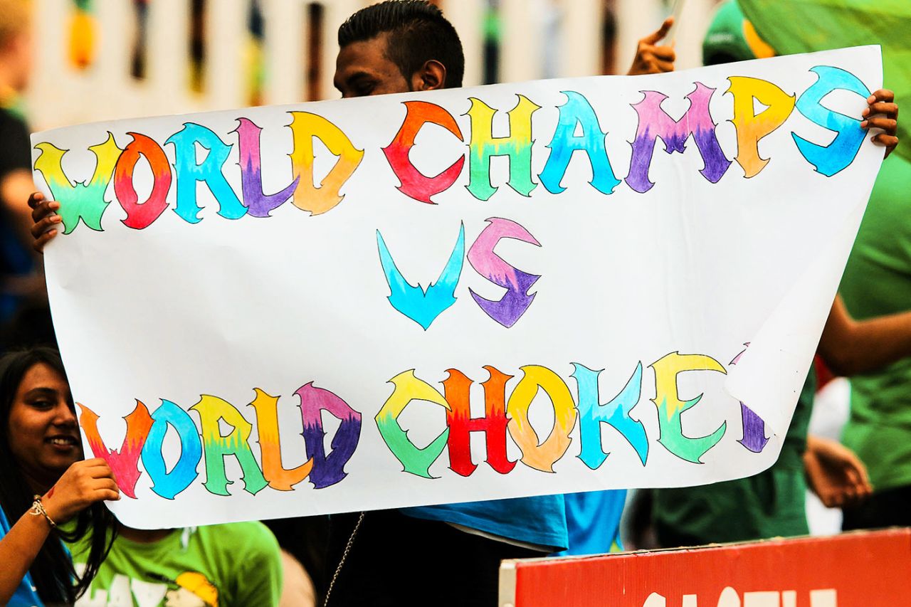 Fans hold up a poster mocking South Africa's malaise in big tournaments, South Africa v India, 2nd ODI, Durban, December 8, 2013