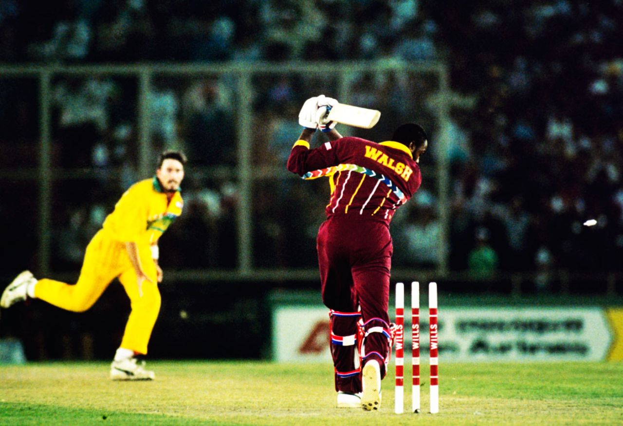 Courtney Walsh is bowled for a first-ball duck by Damien Fleming, Australia v West Indies, 2nd semi-final, World Cup, Mohali, March 14, 1996