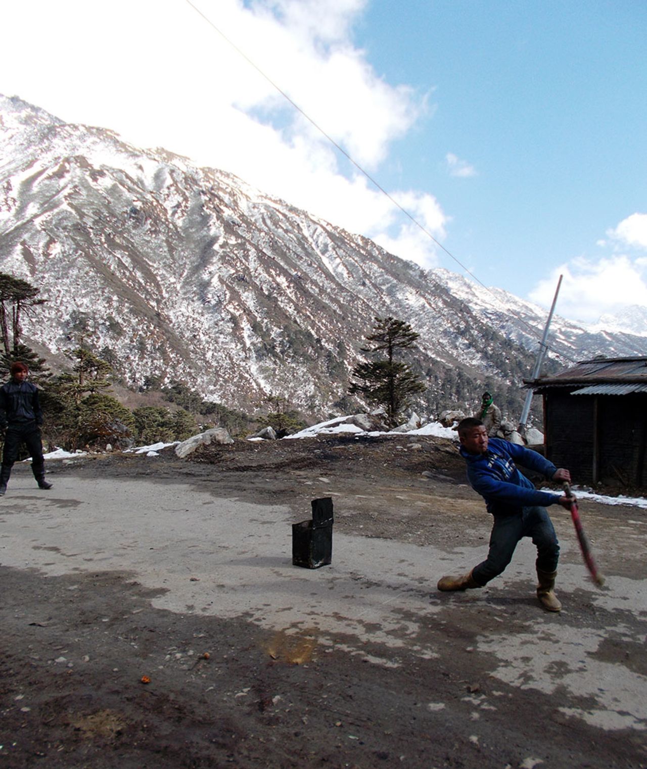 <b>Manasa Ramakrishnan</b>: A boy plays a picture-perfect drive 13,000 feet above sea level, at a village near Yumthang Valley in North Sikkim