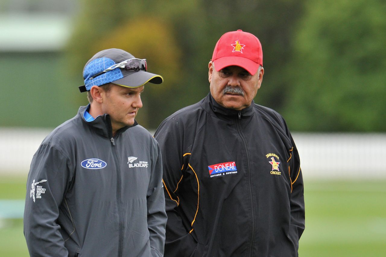 Coaching classes: Mike Hesson and Dav Whatmore have a chat, New Zealand v Zimbabwe, World Cup warm-up match, Lincoln, February 9, 2015
