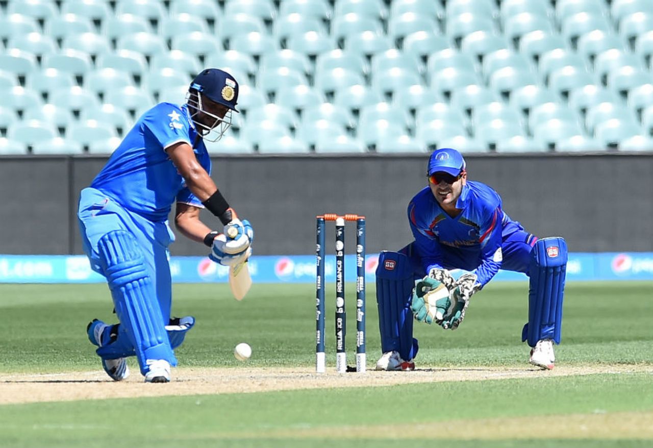 Suresh Raina plays an inside-out shot over cover, Afghanistan v India, World Cup warm-ups, Adelaide, February 10, 2015