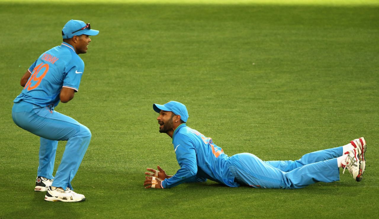 Umesh Yadav and Shikhar Dhawan combined to take a crazy catch, Afghanistan v India, World Cup warm-ups, Adelaide, February 10, 2015