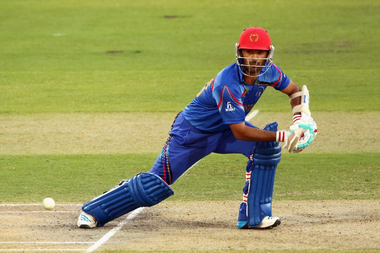 Nawroz Mangal steers the ball off the front foot, Afghanistan v India, World Cup warm-ups, Adelaide, February 10, 2015