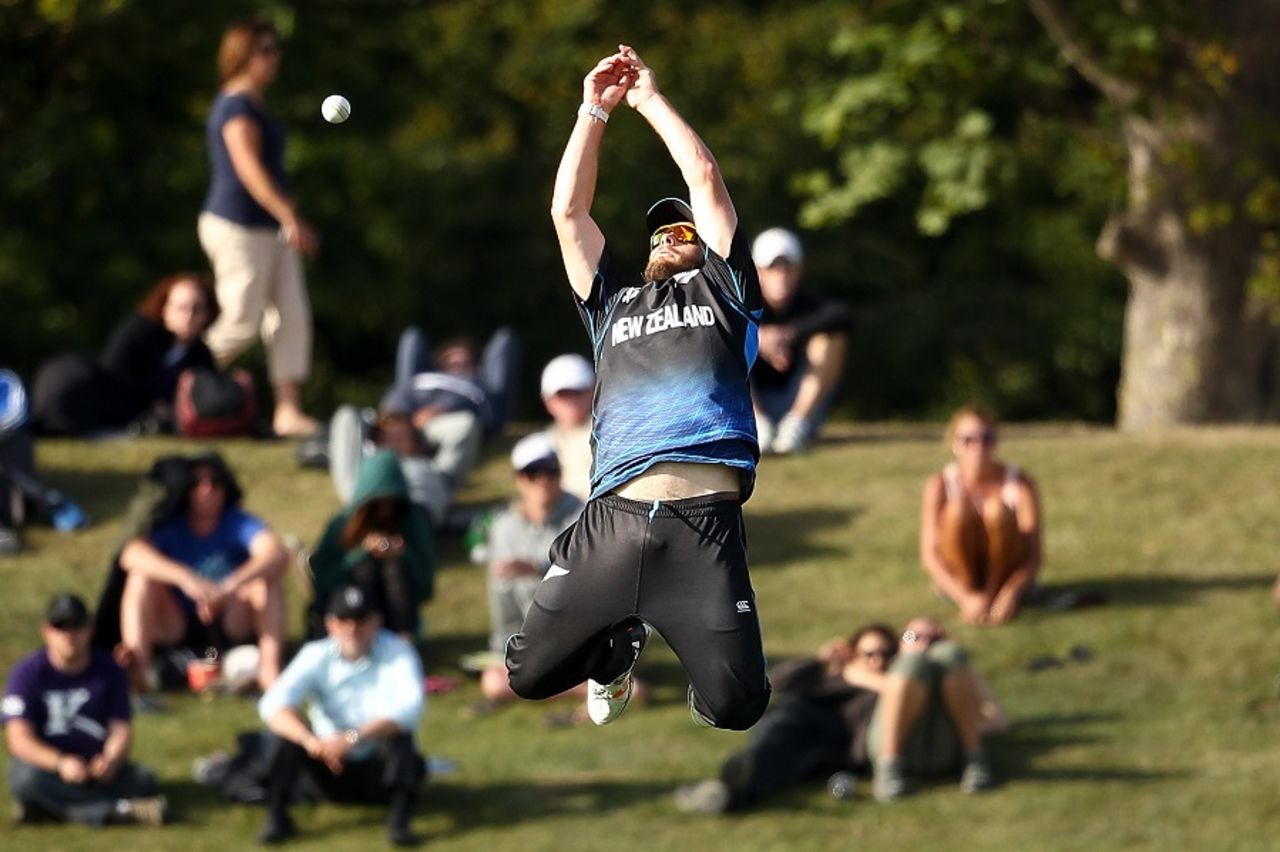 An airborne Corey Anderson attempts to take a catch,  New Zealand v South Africa, World Cup warm-up match, Christchurch, February 11, 2015