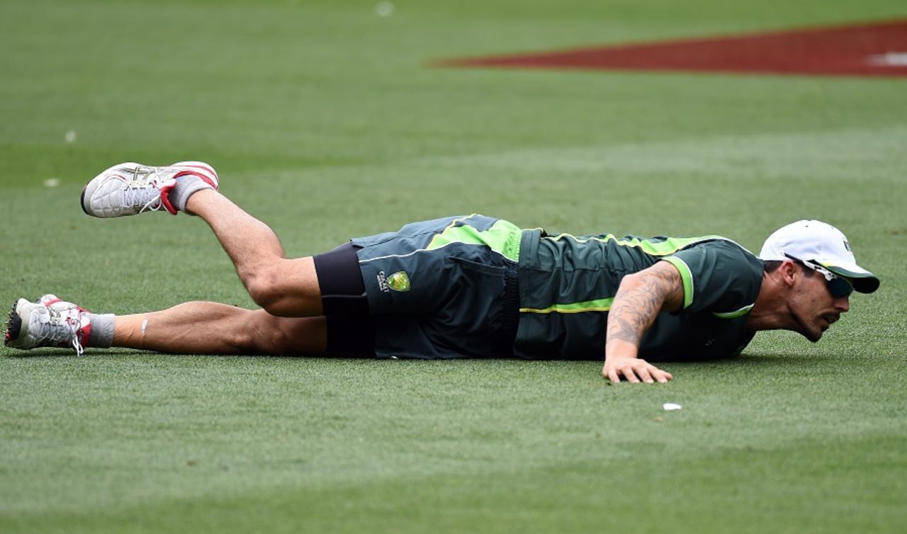 Mitchell Johnson stretches during a training session, World Cup 2015, Melbourne, February 13, 2015