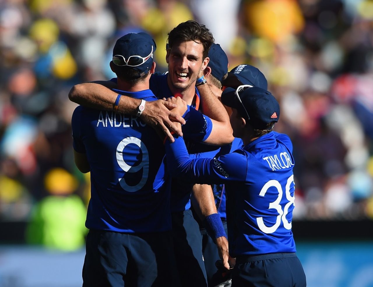 Steve Finn is congratulated by team-mates on his hat-trick, Australia v England, Group A, World Cup 2015, Melbourne, February 14, 2015