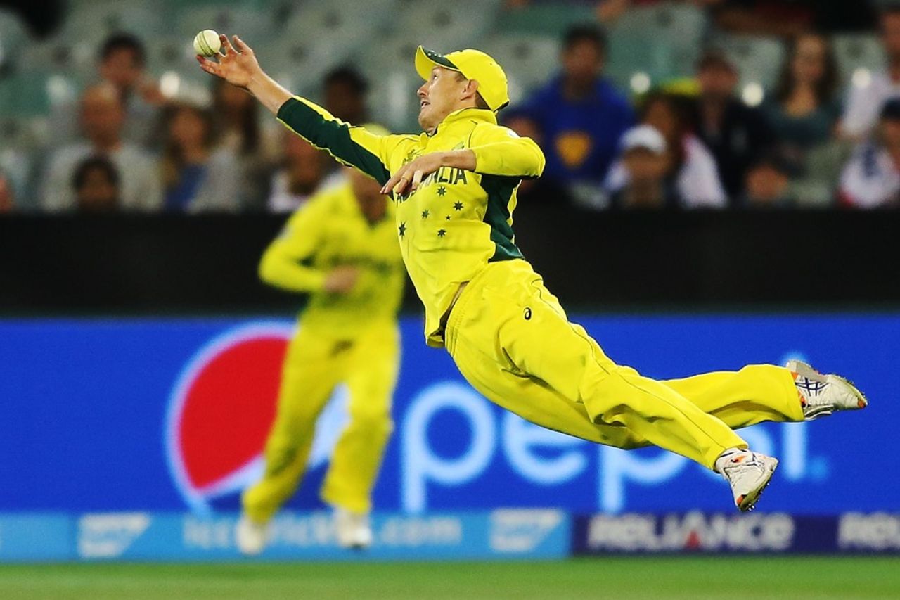 George Bailey leaps off the ground in pursuit of a catch, Australia v England, Group A, World Cup 2015, Melbourne, February 14, 2015