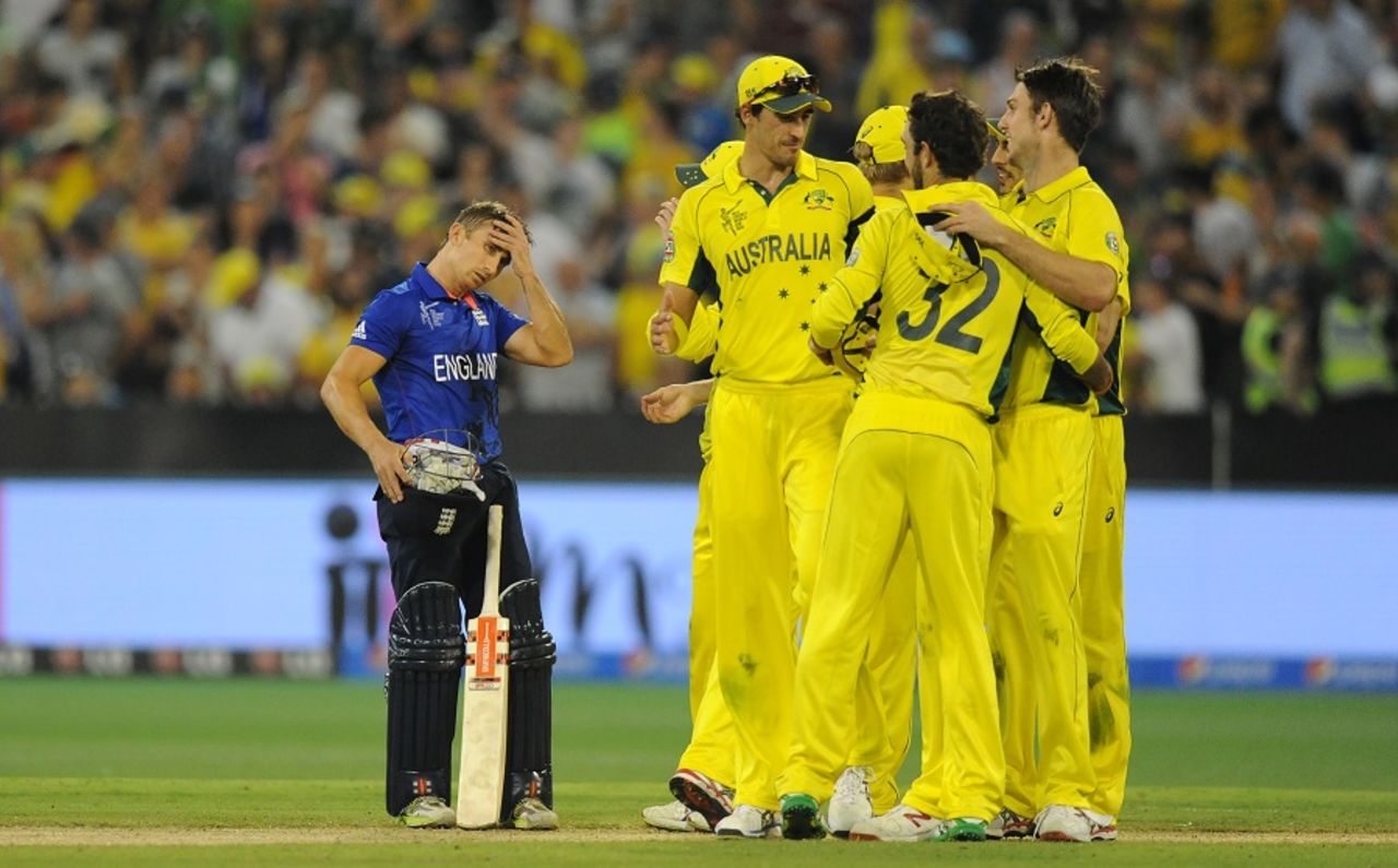 A disappointed James Taylor watches Australia celebrate, Australia v England, Group A, World Cup 2015, Melbourne, February 14, 2015