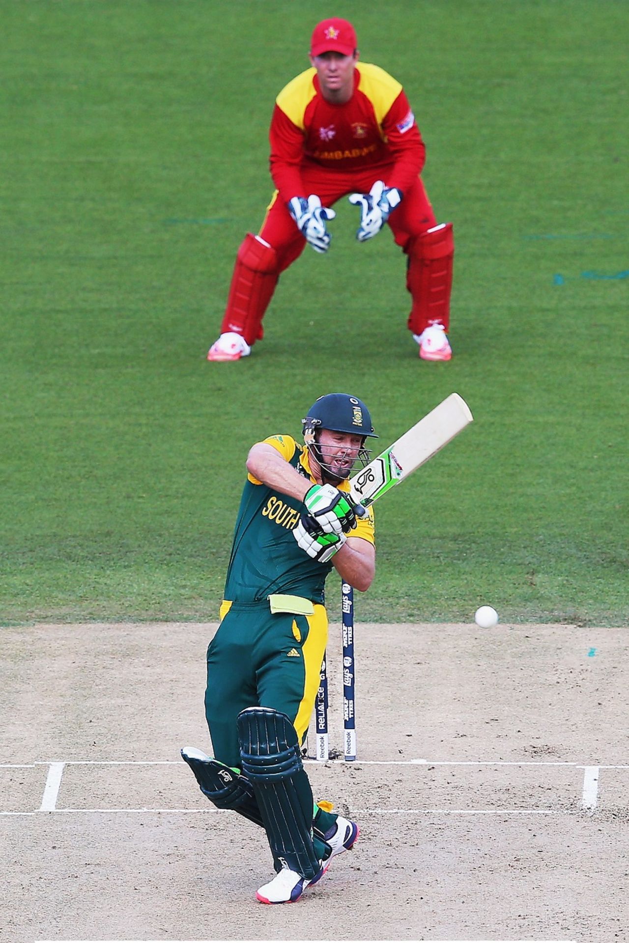 AB de Villiers, having advanced at the bowler, adjusts to play a pull, Group B, World Cup 2015, Hamilton, February 15, 2015