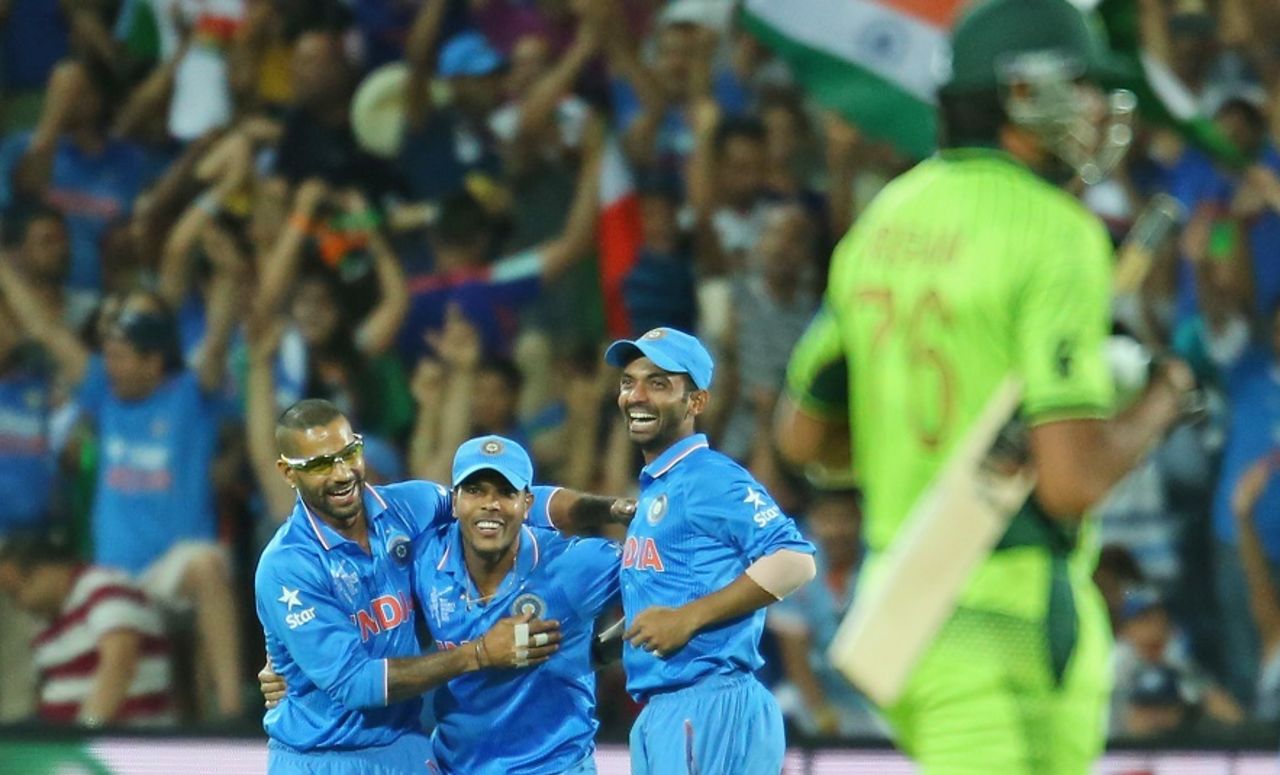The India players rejoice after clinching victory against Pakistan, India v Pakistan, World Cup 2015, Group B, Adelaide, February 15, 2015