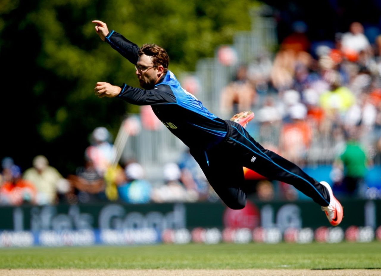 Superman: Daniel Vettori dives to intercept the ball, New Zealand v Scotland, World Cup 2015, Group A, Dunedin, February 17, 2015