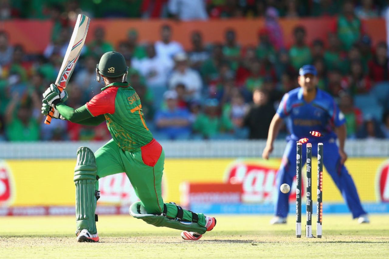 Shakib Al Hasan watches the bails light up as he is bowled by Hamid Hassan, Afghanistan v Bangladesh, World Cup 2015, Group A, Canberra, February 18, 2015