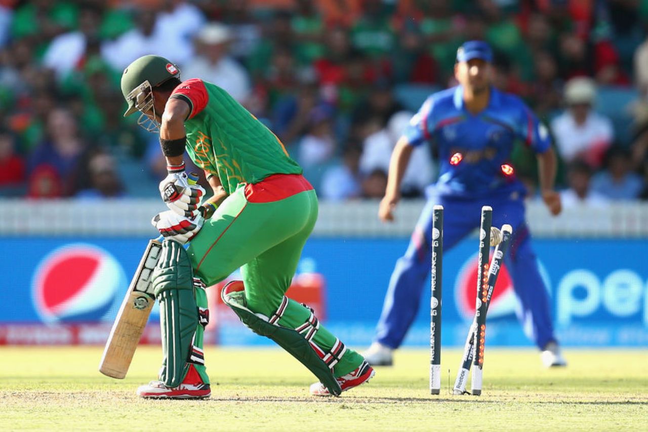 Sabbir Rahman has his middle stump pegged back  by a Hamid Hassan delivery, Afghanistan v Bangladesh, World Cup 2015, Group A, Canberra, February 18, 2015