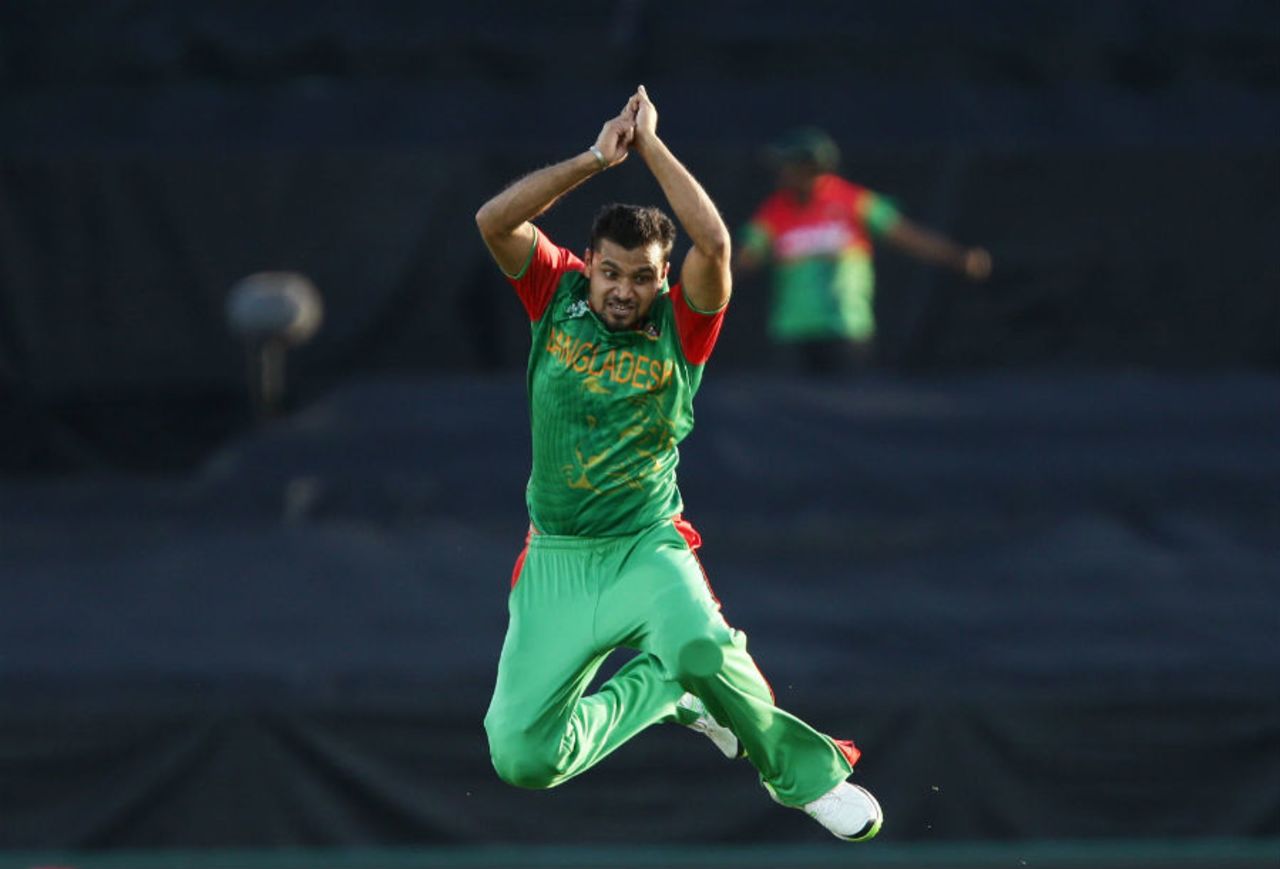 Bangladesh captain Mashrafe Mortaza celebrates the wicket of Asghar Stanikzai, Afghanistan v Bangladesh, World Cup 2015, Group A, Canberra, February 18, 2015