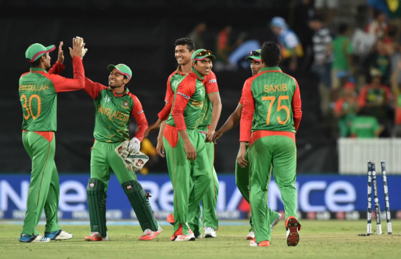 Bangladesh players celebrate after their 105-run victory over Afghanistan, Afghanistan v Bangladesh, World Cup 2015, Group A, Canberra, February 18, 2015