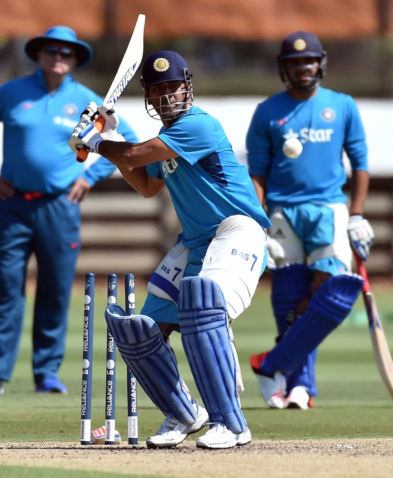 MS Dhoni prepares to smite the ball, World Cup, Melbourne, February 20, 2015