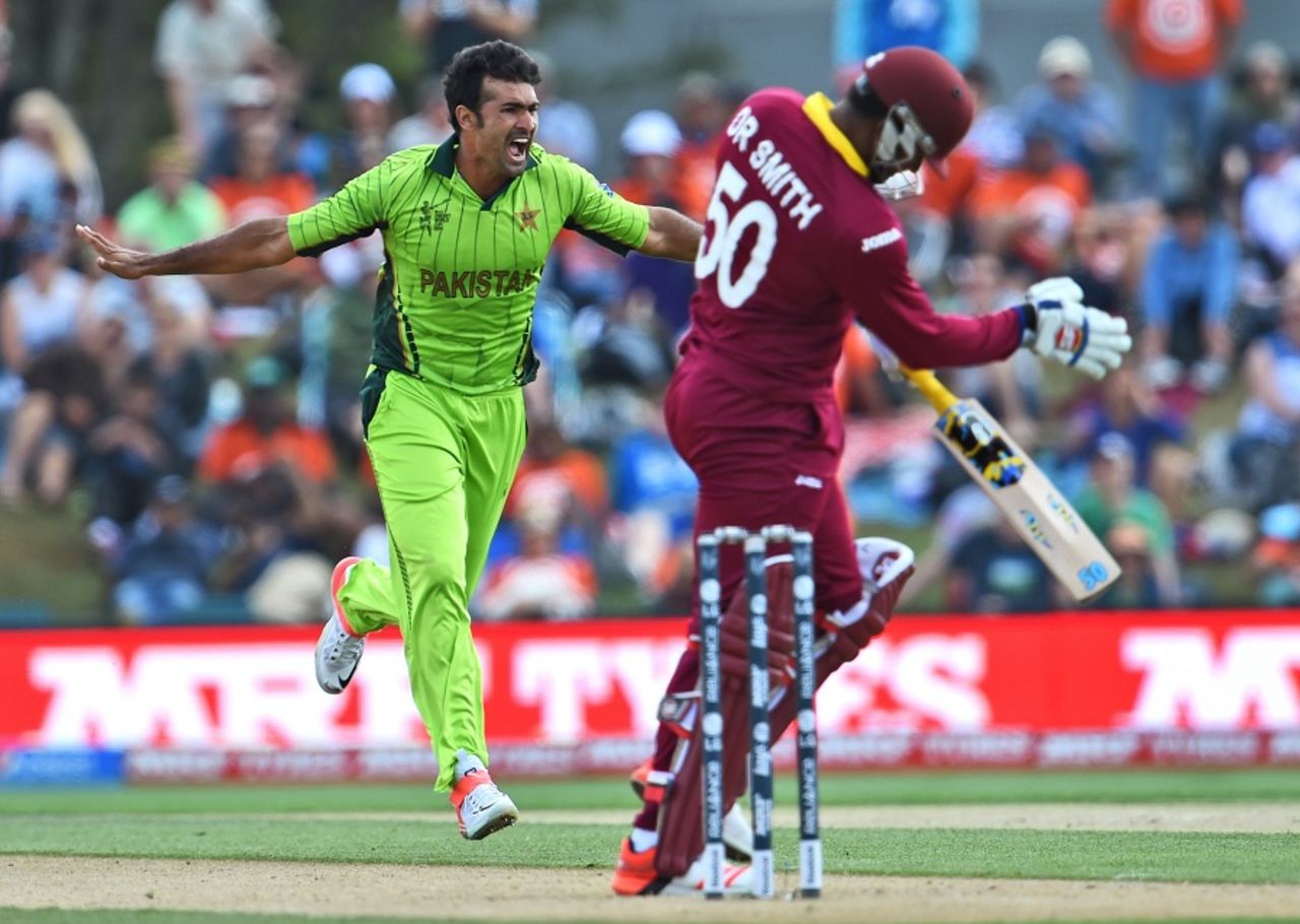 Frustration and ecstasy: Dwayne Smith and Sohail Khan display contrasting emotions, Pakistan v West Indies, World Cup 2015, Group B, Christchurch, February 21, 2015