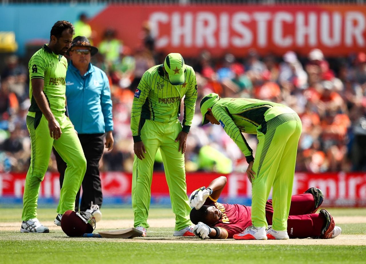 Players check on Darren Bravo after he was struck on the head, Pakistan v West Indies, World Cup 2015, Group B, Christchurch, February 21, 2015