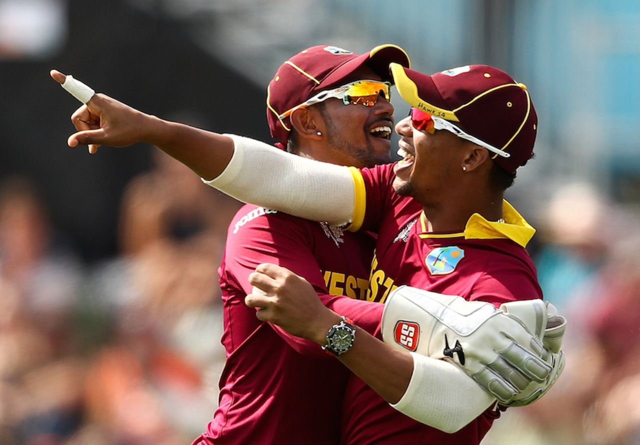 Lendl Simmons and Denesh Ramdin are pumped after dismissing Ahmed Shehzad, Pakistan v West Indies, World Cup 2015, Group B, Christchurch, February 21, 2015