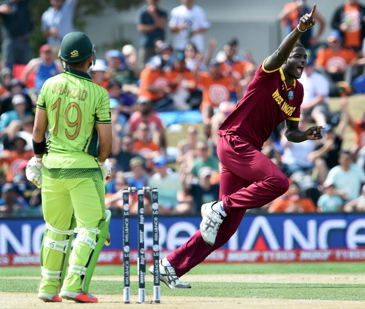 Jason Holder wheels away in delight after dismissing Ahmed Shehzad for 1, Pakistan v West Indies, World Cup 2015, Group B, Christchurch, February 21, 2015