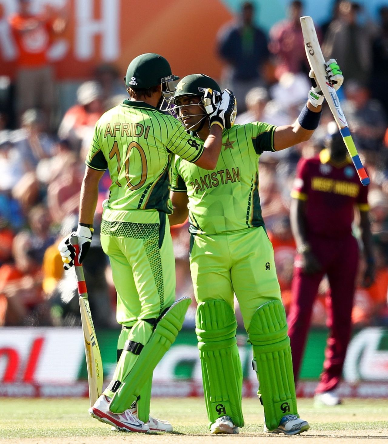 Shahid Afridi congratulates Umar Akmal on the latter's fifty, Pakistan v West Indies, World Cup 2015, Group B, Christchurch, February 21, 2015