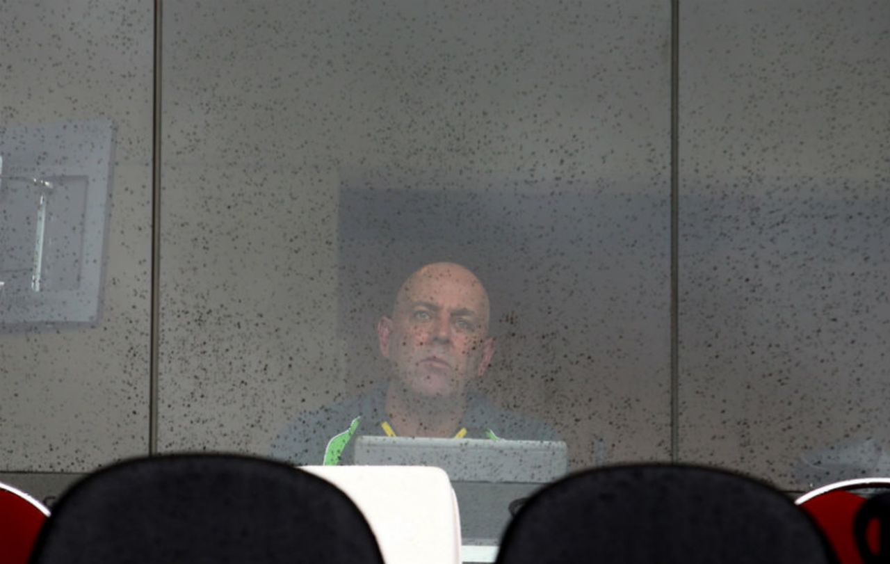 Darren Lehmann watches from the dressing room as the rain shows no signs of stopping, Australia v Bangladesh, Group A, World Cup 2015, Brisbane, February 21, 2015