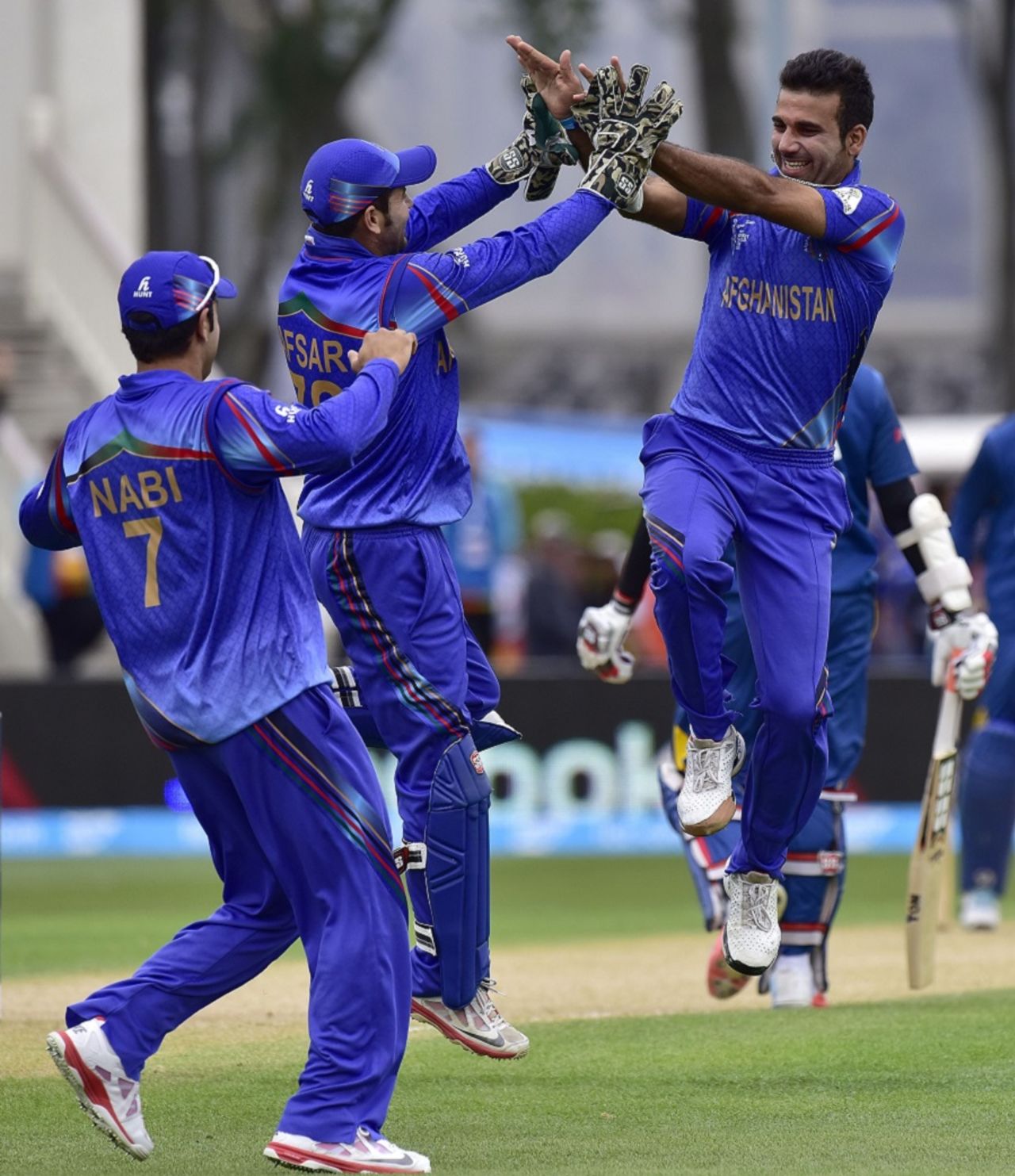 Dawlat Zadran is ecstatic after striking first ball, Afghanistan v Sri Lanka, World Cup 2015, Group A, Dunedin