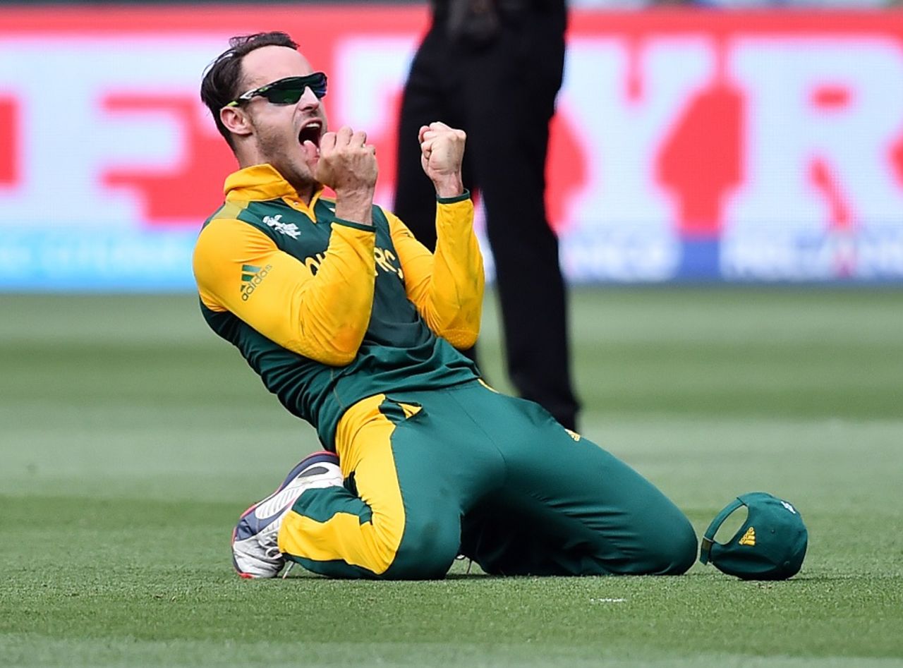 Faf du Plessis is delighted after pouching Virat Kohli for 46, India v South Africa, World Cup 2015, Group B, Melbourne, February 22, 2015