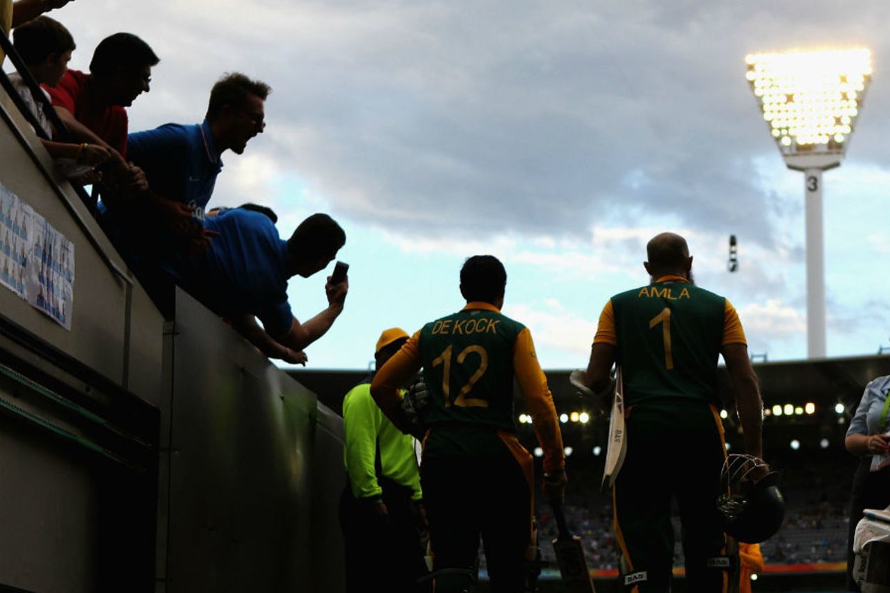 Fronting up: Quinton de Kock and Hashim Amla walk in to bat, India v South Africa, World Cup 2015, Group B, Melbourne, February 22, 2015