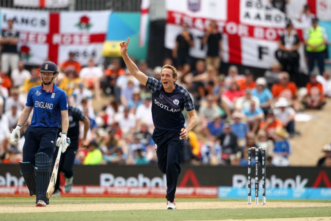 Josh Davey celebrates the wicket of Joe Root as Eoin Mogan watches from the non-striker's end, England v Scotland, World Cup 2015, Group A, Christchurch, February 23, 2015