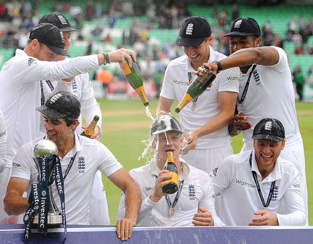 Sam Robson has champagne poured over him by his team-mates, England v India, 5th Investec Test, The Oval, 3rd day, August 17, 2014