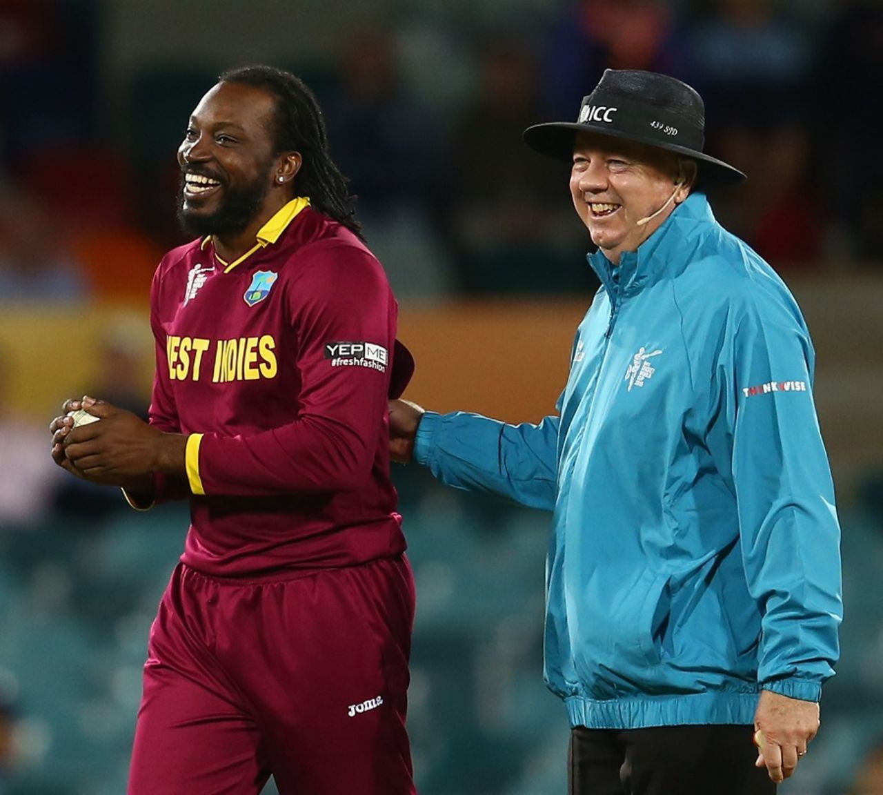 Chris Gayle shares a lighter moment with umpire Ian Gould, West Indies v Zimbabwe, World Cup 2015, Group B, Canberra, February 24, 2015