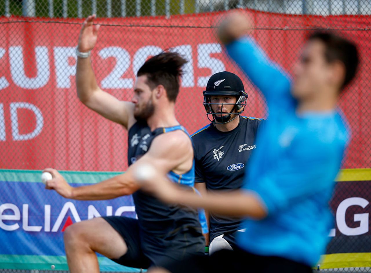 Martin Guptill watches Mitchell McClenaghan during training, Auckland, February 25, 2015