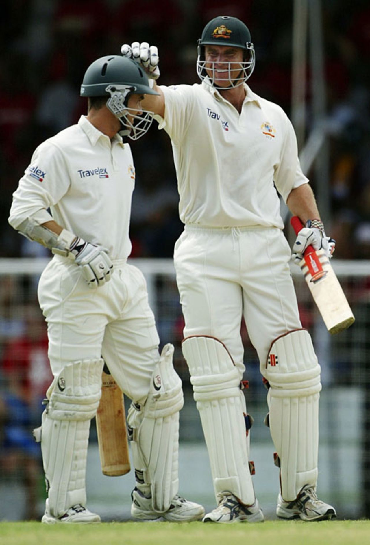 Justin Langer and Matthew Hayden celebrate their double-century opening partnership, West Indies v Australia, 4th Test, Anitgua, 3rd day, March 11, 2003