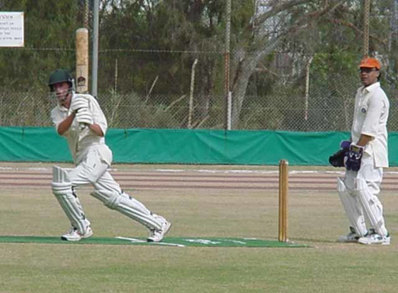 Hotz plays to leg as Talkar looks on.