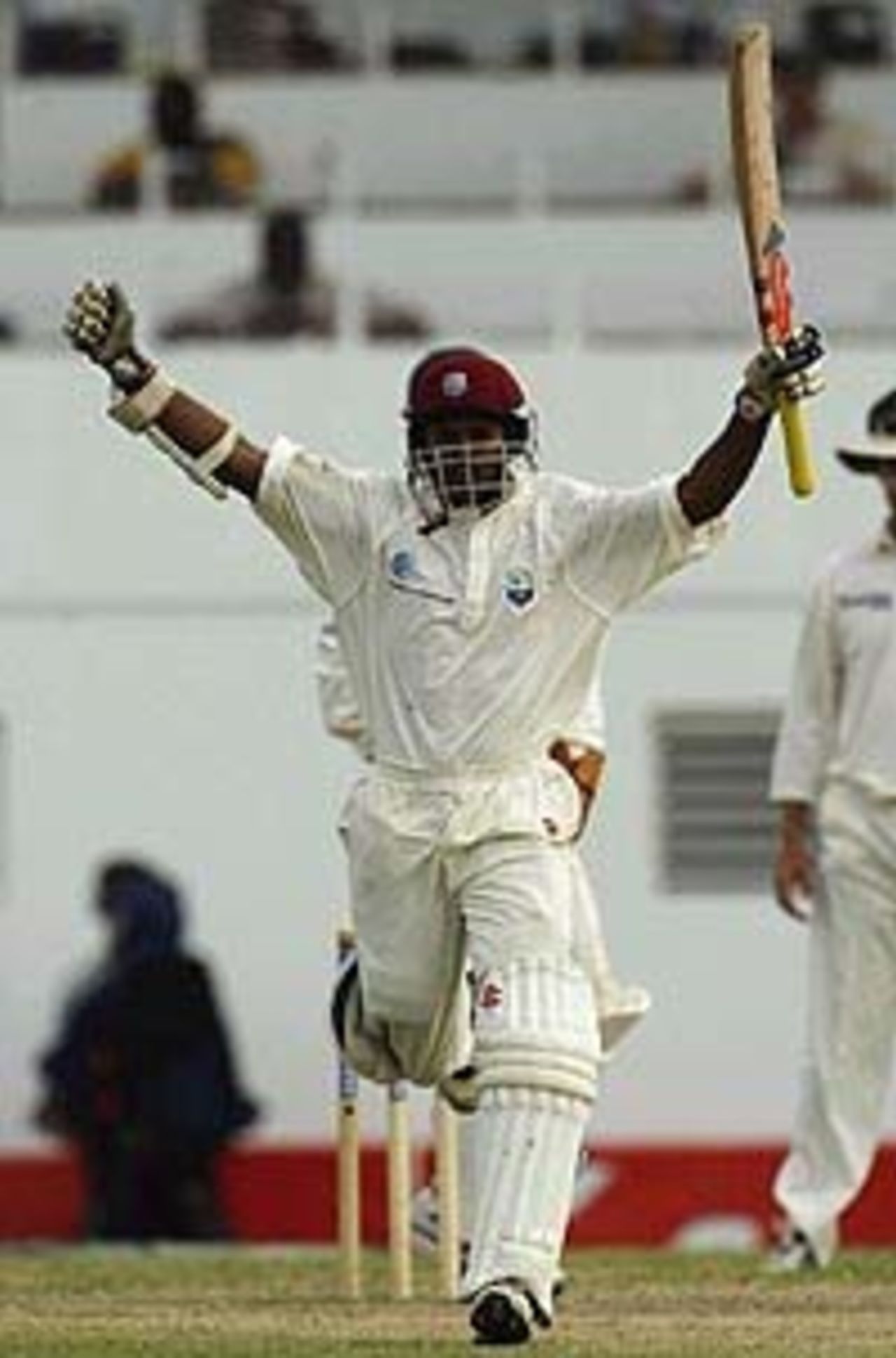 ST JOHN'S, ANTIGUA - MAY 12: Shivnarine Chanderpaul of the West Indies celebrates his century during day four of the Fourth Test between the West Indies and Australia on May 12, 2003 at the Recreation Oval in St John's, Antigua.