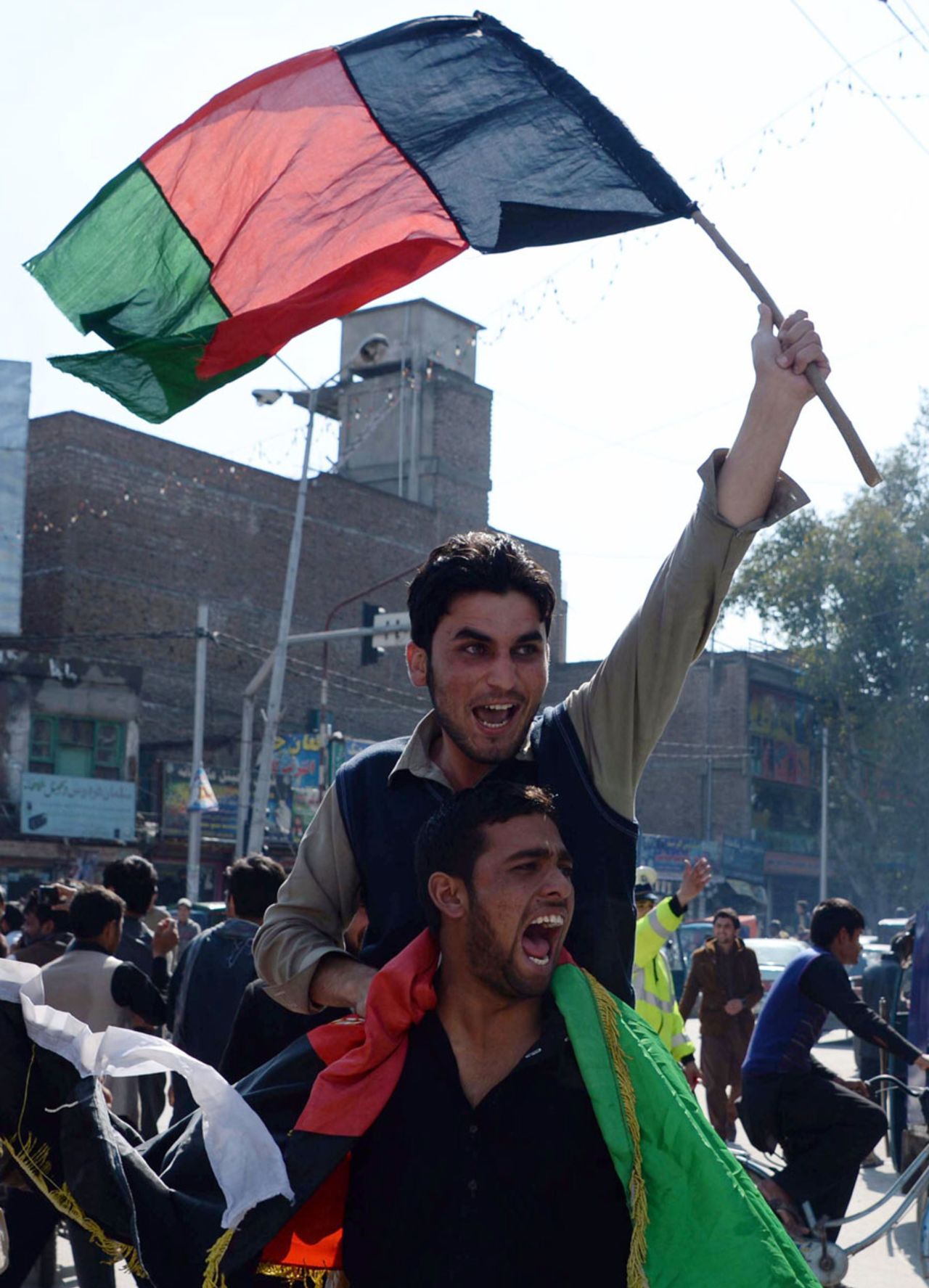 Fans celebrate Afghanistan's World Cup win over Scotland, Jalalabad, February 26, 2015