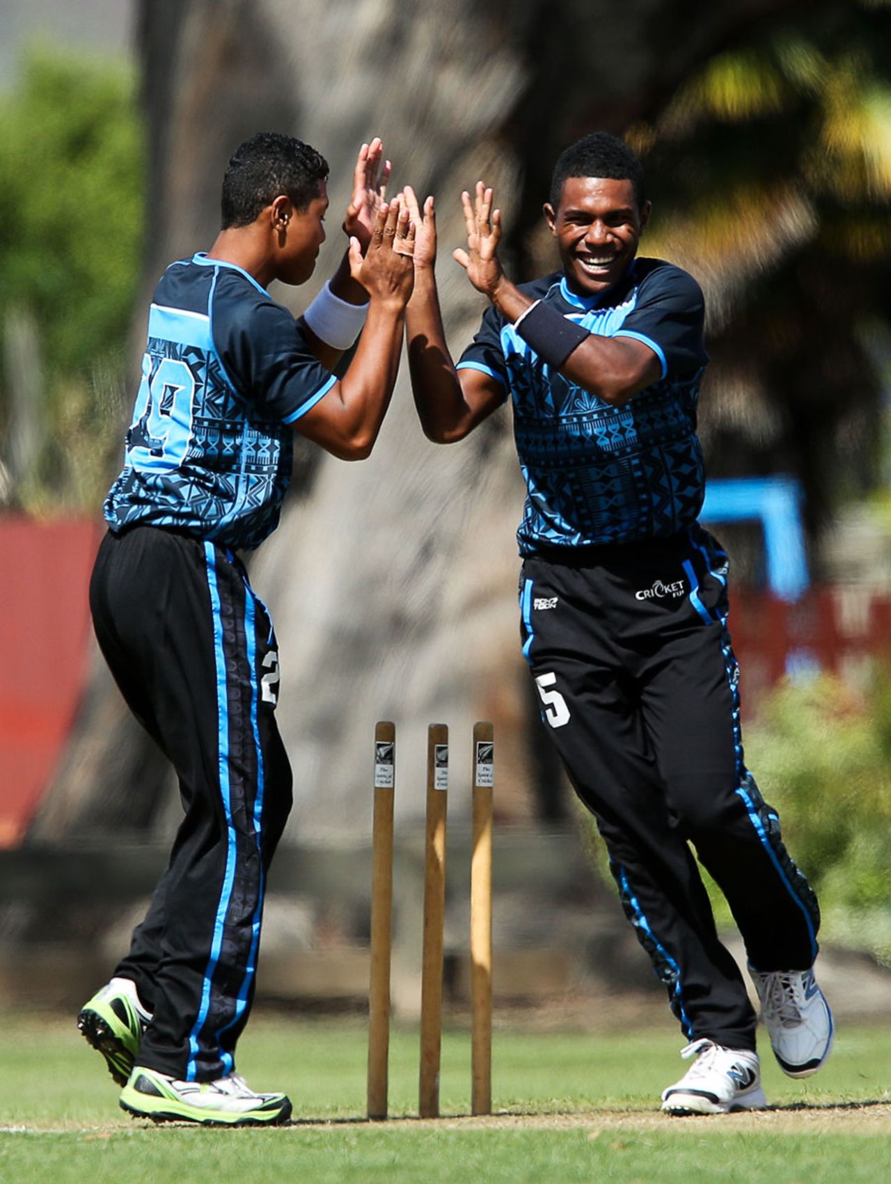 Delaimatuku Maraiwaia (left) and Josaia Baleicikoibia celebrate a wicket for Fiji, Fiji v Samoa, EAP U-19 Trophy, Blenheim, February 27, 2015