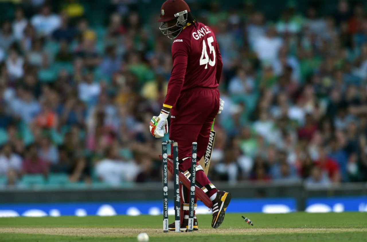 Chris Gayle watches in despair as his leg stump is rattled by a Kyle Abbott delivery, South Africa v West Indies, World Cup 2015, Group B, Sydney, February 27, 2015