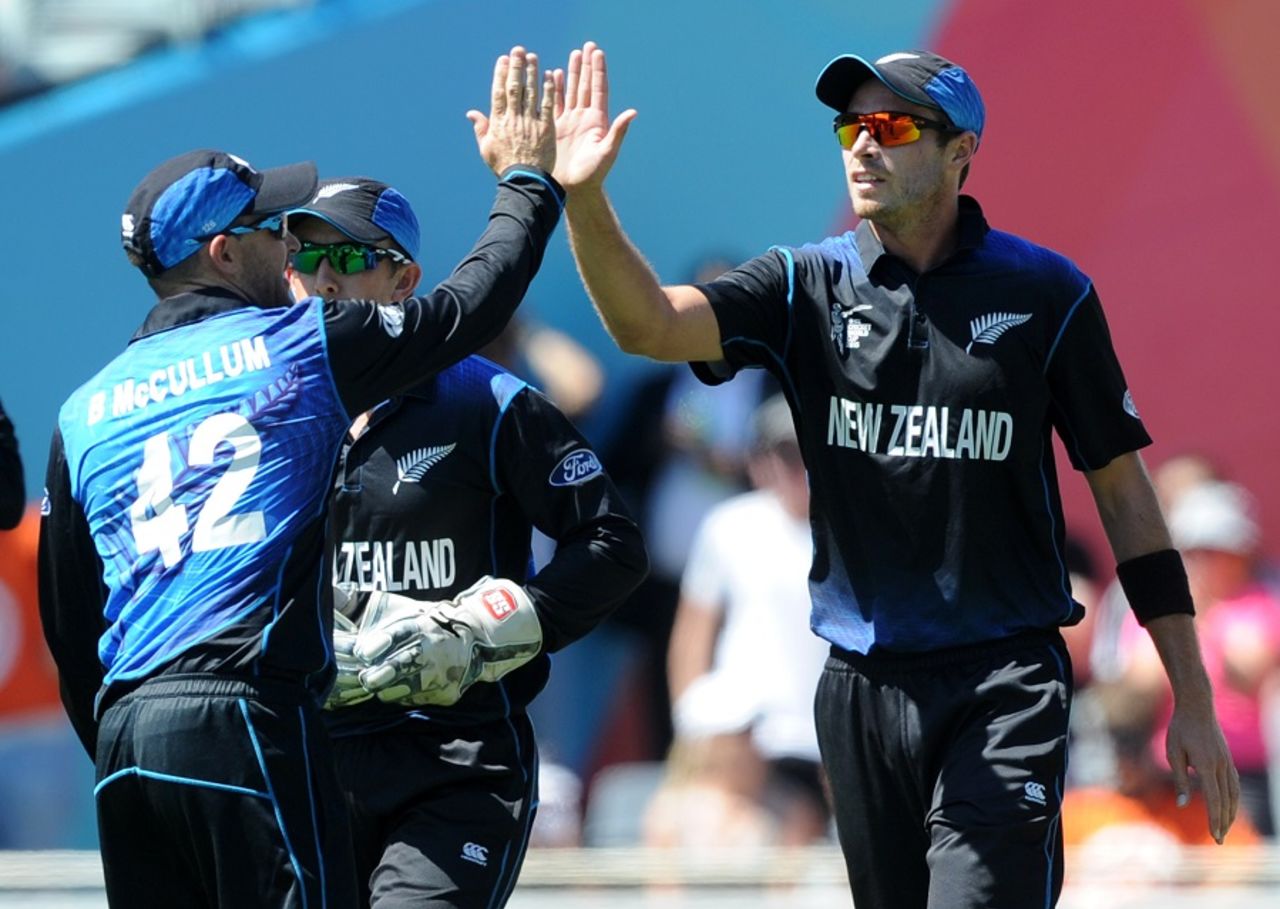 Tim Southee is congratulated by Brendon McCullum on taking a catch, New Zealand v Australia, World Cup 2015, Group A, Auckland, February 28, 2015
